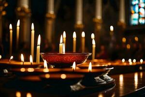 kaarsen zijn lit in een kerk met kaarsen in de achtergrond. ai-gegenereerd foto