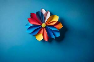 een kleurrijk papier bloem Aan een blauw muur. ai-gegenereerd foto