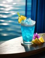 foto van sommige blauw lagune cocktail drinken elegant geplateerd Aan een tafel. generatief ai