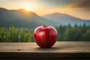 een rood appel zit Aan een houten tafel in voorkant van een berg visie. ai-gegenereerd foto