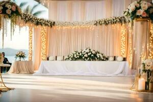 een bruiloft ceremonie is reeks omhoog in een kamer met wit en goud decoraties. ai-gegenereerd foto