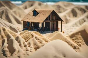 een miniatuur huis zit Aan top van zand duinen. ai-gegenereerd foto