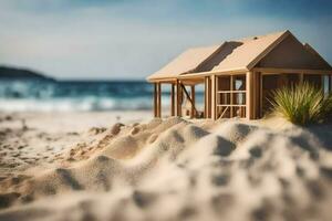 een miniatuur huis Aan de strand met zand en gras. ai-gegenereerd foto