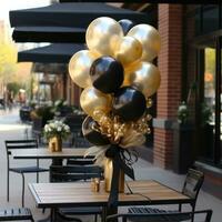 elegant zwart en goud ballon arrangement foto