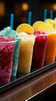 kleurrijk rij van plastic kop slushies, boordevol met bevroren fruitig goedheid verticaal mobiel behang ai gegenereerd foto