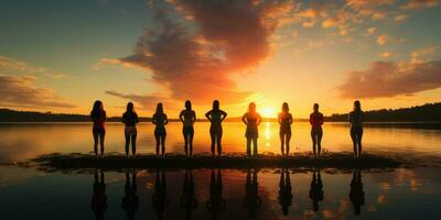 een groep van mensen aan het doen yoga door de water Bij zonsondergang. generatief ai foto