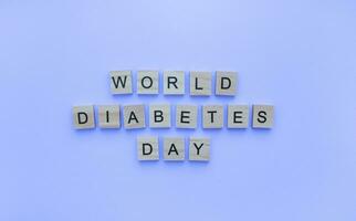 november 14, wereld diabetes dag, minimalistisch banier met de opschrift in houten brieven foto