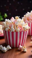 vers popcorns in beroep gaan tentoongesteld Aan roze tafel, een filmische visie van de voorkant verticaal mobiel behang ai gegenereerd foto