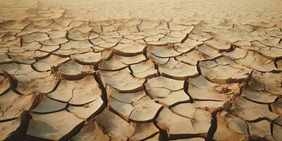 droog gebarsten aarde achtergrond. globaal opwarming en klimaat verandering concept. ai generatief foto