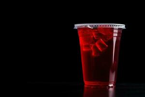 rood drinken in een plastic kop geïsoleerd Aan een zwart achtergrond. nemen weg drankjes concept met kopiëren ruimte. ai gegenereerd foto