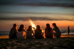 een strand vreugdevuur met vrienden foto