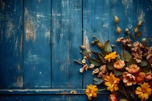 een blauw houten bord met bloemen Aan het foto