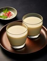 foto van sommige Koreaans makgeolli drinken elegant geplateerd Aan een tafel. generatief ai