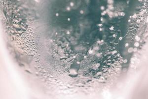 macro-opname van een glas met druppels water foto