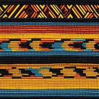 kleurrijk Afrikaanse kente kleding kleding stof achtergrond weergeven traditioneel tribal patronen foto