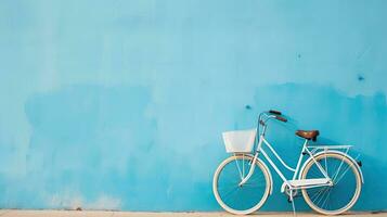 fiets Aan blauw muur met kopiëren ruimte voor uw tekst of ontwerp. generatief ai foto