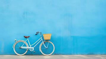 fiets Aan blauw muur met kopiëren ruimte voor uw tekst of ontwerp. generatief ai foto