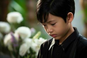 portret van weinig Aziatisch jongen met verdrietig expressie.begrafenis concept ai gegenereerd foto