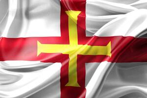 Guernsey vlag - realistische wapperende stoffen vlag foto