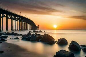 de zon sets over- een brug en rotsen Aan de strand. ai-gegenereerd foto