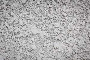 haveloze zandstraal betonnen muur textuur achtergrond foto
