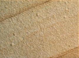 close-up zand steen textuur. foto