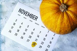 pompoen Aan november 2019 kalender met dankzegging dag gemarkeerd foto