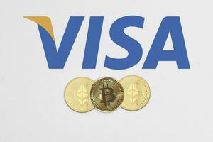bitcoin en ethereum cryptogeld munten Aan Visa logotype foto