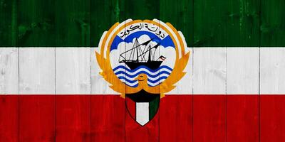 vlag en jas van armen van staat van Koeweit Aan een getextureerde achtergrond. concept collage. foto