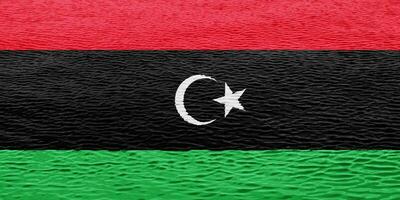 vlag van staat van Libië Aan een getextureerde achtergrond. concept collage. foto