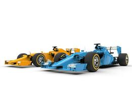 blauw en geel formule een auto's - kant door kant foto