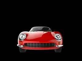 wijnoogst rood sport- auto - voorkant visie detailopname schot - geïsoleerd Aan zwart achtergrond foto