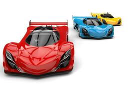 geweldig rood, blauw en geel concept sport- auto's - voorkant visie foto