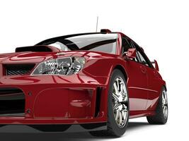 karmozijn rood modern gt ras auto - voorkant koplamp detailopname schot foto