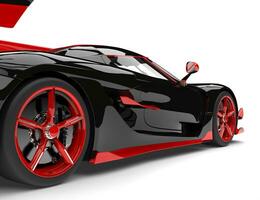 zwart en rood sport- ras super auto - achterzijde wiel detailopname schot foto