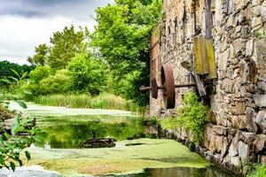 fotografie Aan thema uitstekend gebouw mooi steen oud water molen foto