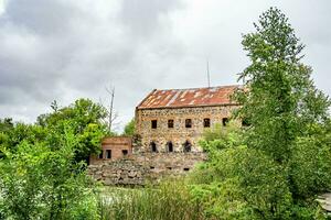 fotografie Aan thema uitstekend gebouw mooi steen oud water molen foto