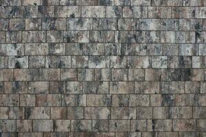 marmeren tegels Aan steen verdieping of muur achtergrond met grijs en bruin kleuren voorkant of top visie foto