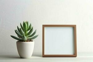 kader bespotten omhoog van blanco afbeelding staand Aan een plank met sappig fabriek of cactus in Scandinavisch concept door ai gegenereerd foto