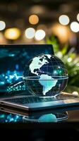 een glas wereldbol Aan een laptop symboliseert een globaal bedrijf perspectief verticaal mobiel behang ai gegenereerd foto
