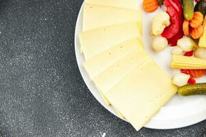 raclette kaas maaltijd groente heerlijk gezond aan het eten Koken voorafje maaltijd voedsel tussendoortje Aan de tafel kopiëren ruimte voedsel foto