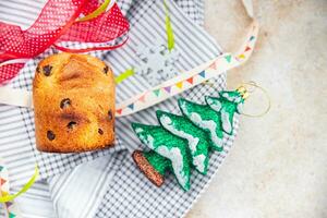 panettone Kerstmis bakken zoet gebakje droog fruit chocola Kerstmis zoet toetje vakantie traktatie nieuw jaar viering maaltijd voedsel tussendoortje Aan de tafel kopiëren ruimte voedsel achtergrond rustiek top visie foto