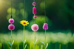 bloemen hangende van een draad in de gras. ai-gegenereerd foto