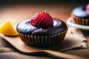 chocola cupcakes met frambozen Aan een houten tafel. ai-gegenereerd foto