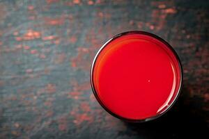sap van rijp tomaten in een glas. foto