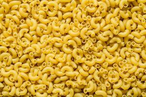 pasta achtergrond. droog pasta. foto