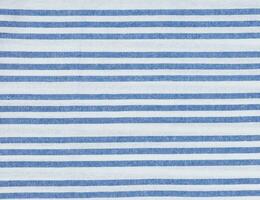 structuur van linnen wit handdoek met blauw strepen foto