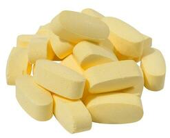 geel ovaal tablets Aan een wit achtergrond, top visie foto