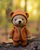 een gehaakt teddy beer vervelend een oranje jasje generatief ai foto