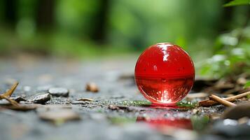 een rood glas bal zittend Aan de grond in de bossen generatief ai foto